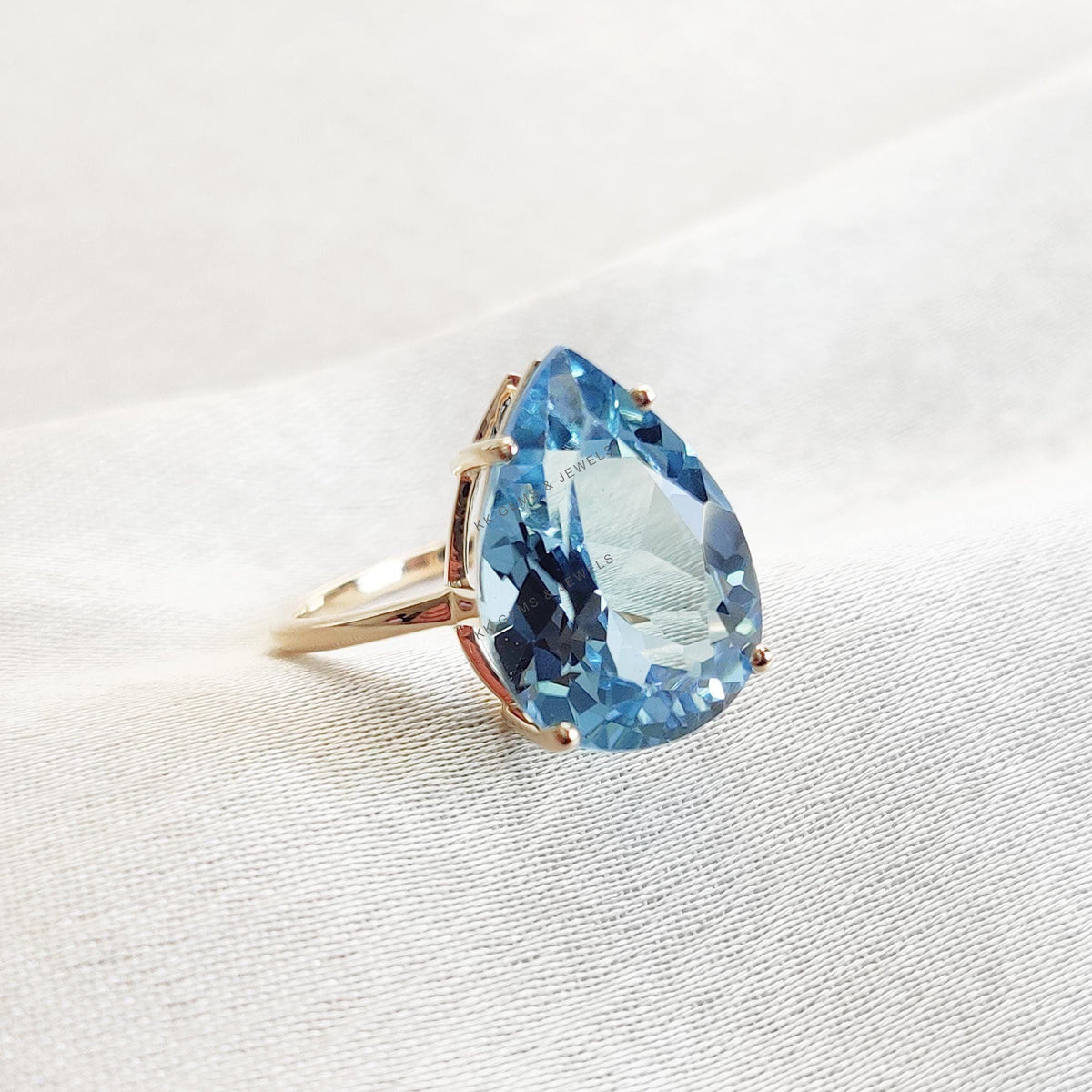 Pear Natural Sky Blue Topaz Ring: 14K Solid Yellow Gold, December Birthstone