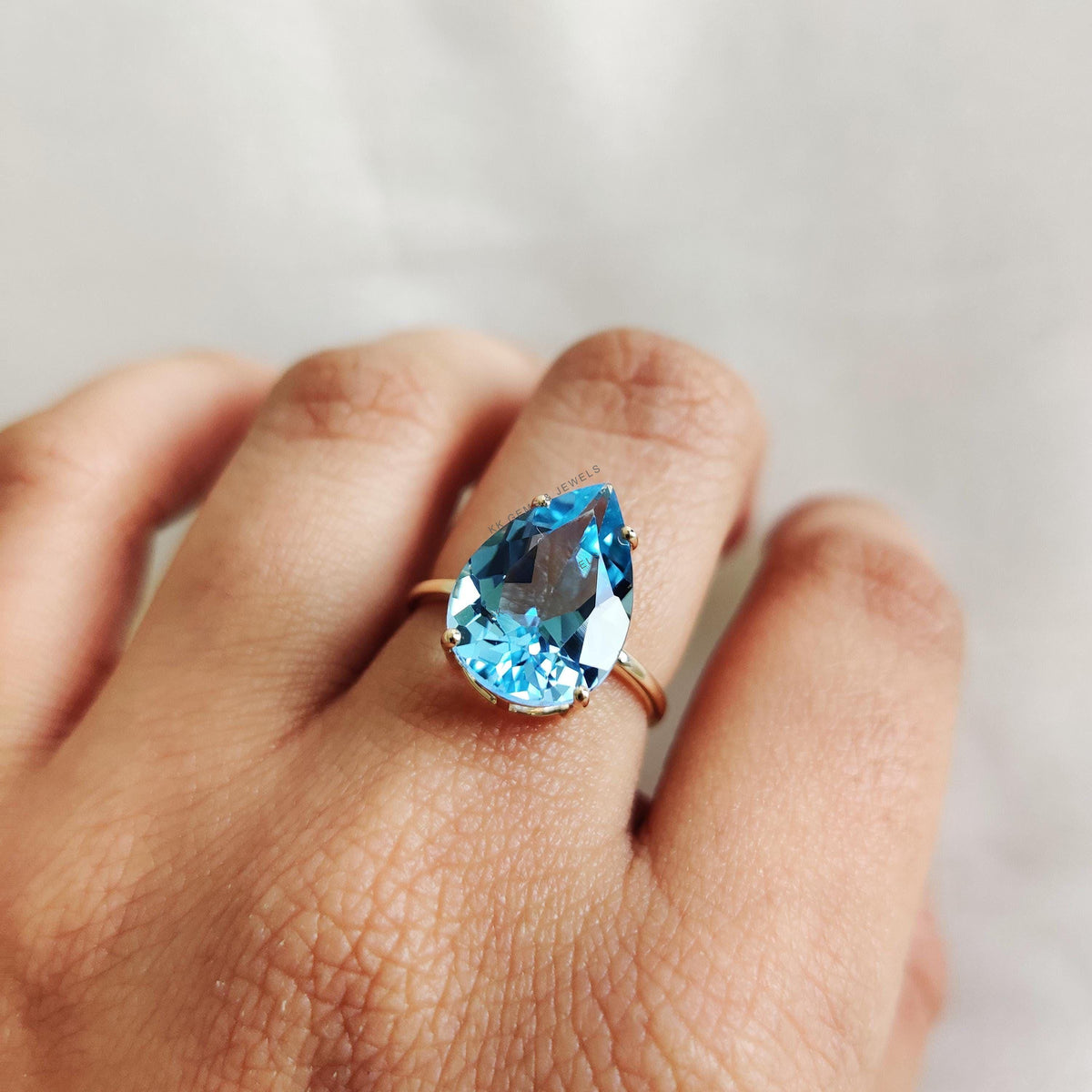 Pear Natural Sky Blue Topaz Ring: 14K Solid Yellow Gold, December Birthstone