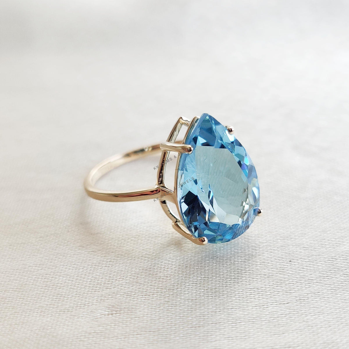 Pear Natural Sky Blue Topaz Ring: 14K Solid Yellow Gold, December Birthstone
