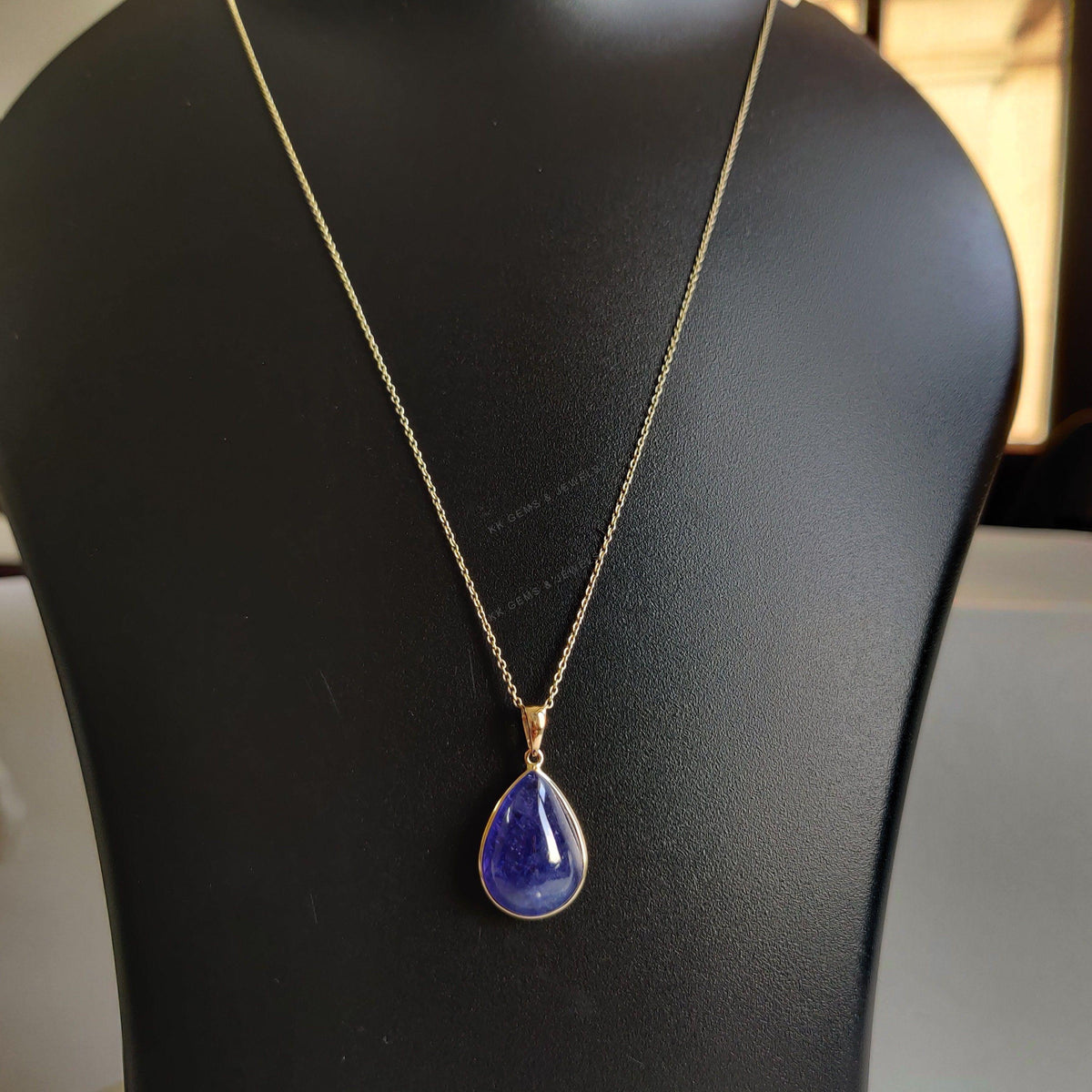 14K Solid Gold Natural Tanzanite Pendant: Pear Cabochon Bezel, December Birthstone