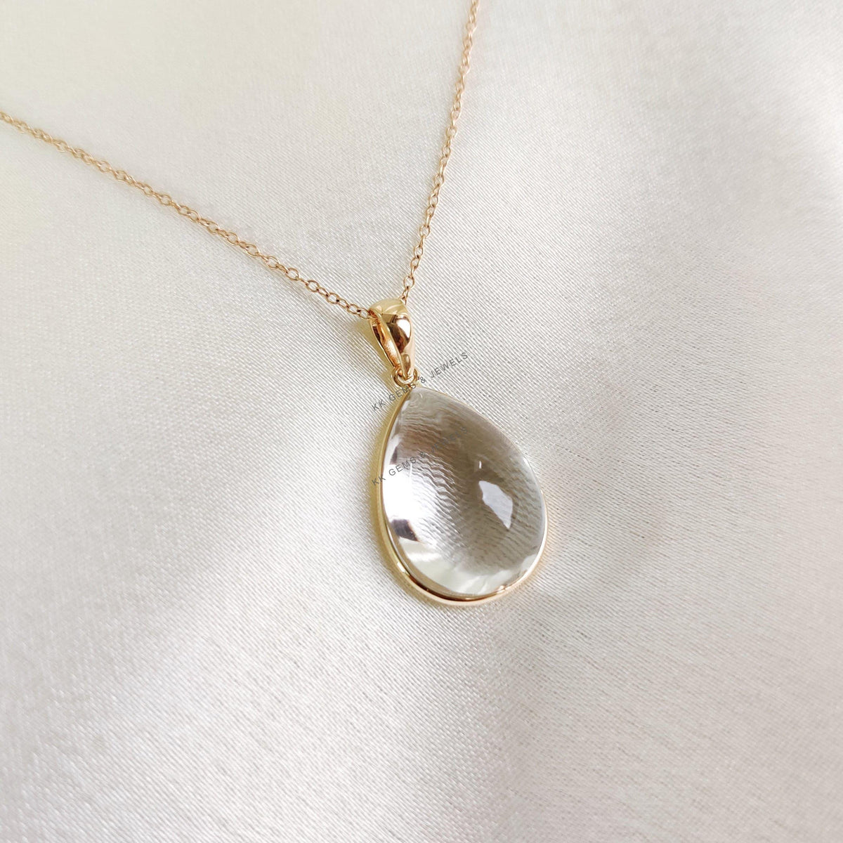 14K Solid Gold Natural Clear Quartz Pendant, Pear Cabochon, April Birthstone